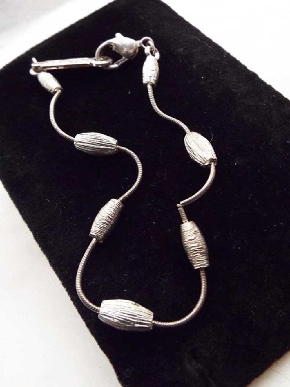 NAPIER SILVERY TURNED & TWISTED BEADS W/ NAPIER NAMEPLATE BRACELET 21